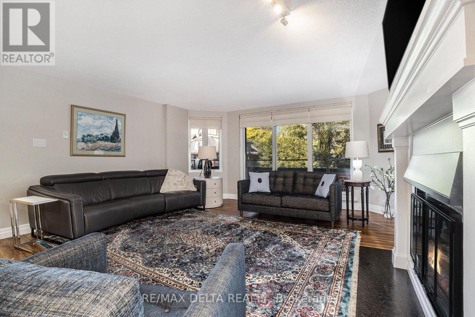 304 - 295 Gilmour Street, Ottawa, ON - Indoor Photo Showing Living Room With Fireplace