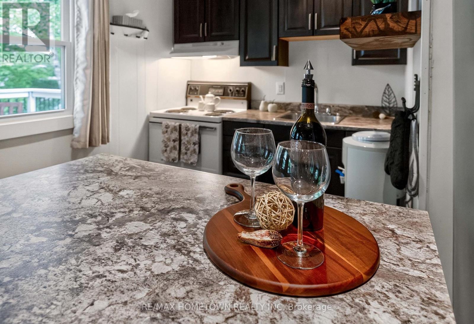 Prep island, with storage and breakfast bar. - 66 Scott Lane, Rideau Lakes, ON - Indoor
