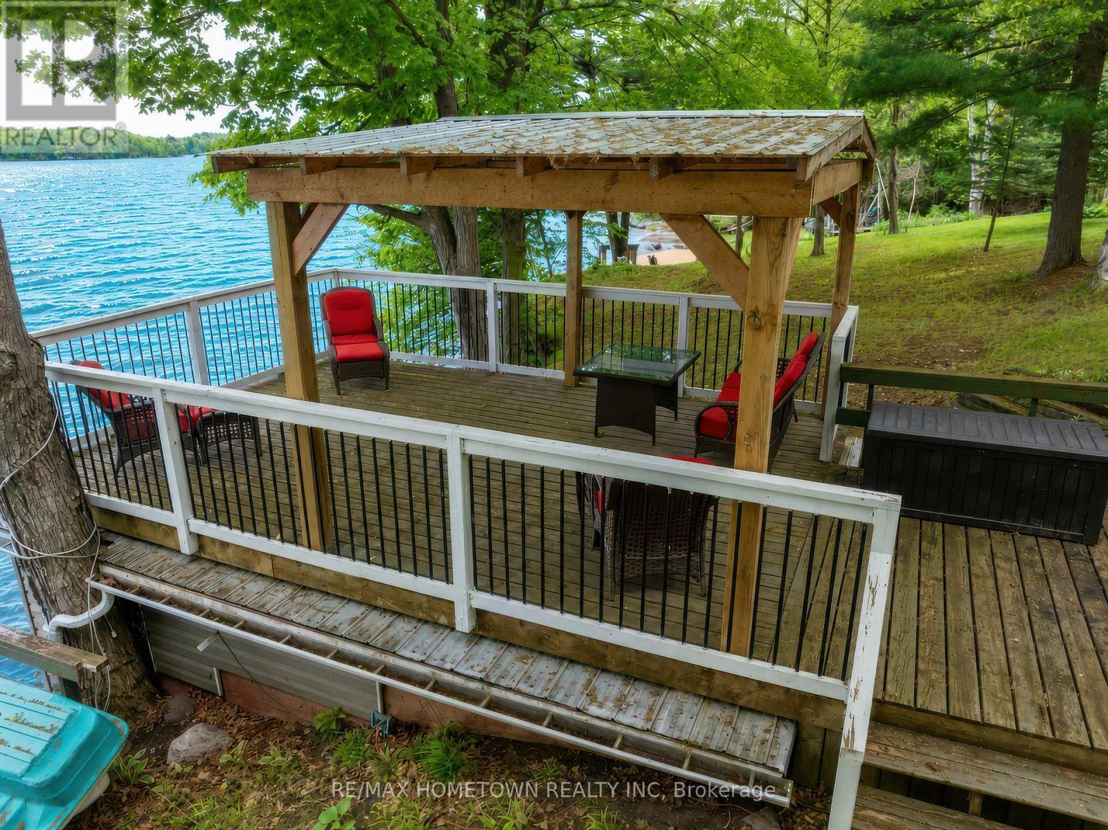 Great spot for a hammock and an afternoon siesta! - 66 Scott Lane, Rideau Lakes, ON - Outdoor With Deck Patio Veranda