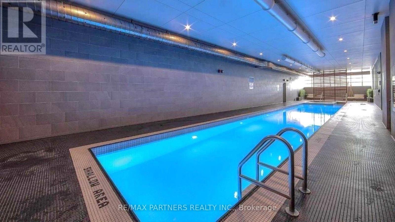 1806 - 15 Iceboat Terrace, Toronto, ON - Photo Showing Other Room With In Ground Pool