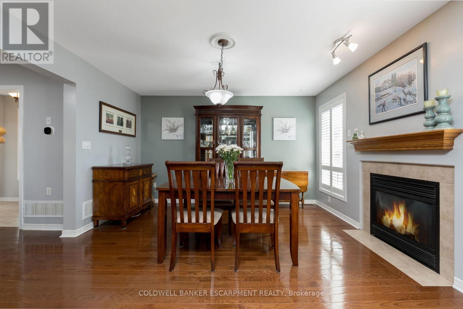 593 Caverhill Crescent, Milton, ON - Indoor Photo Showing Dining Room With Fireplace
