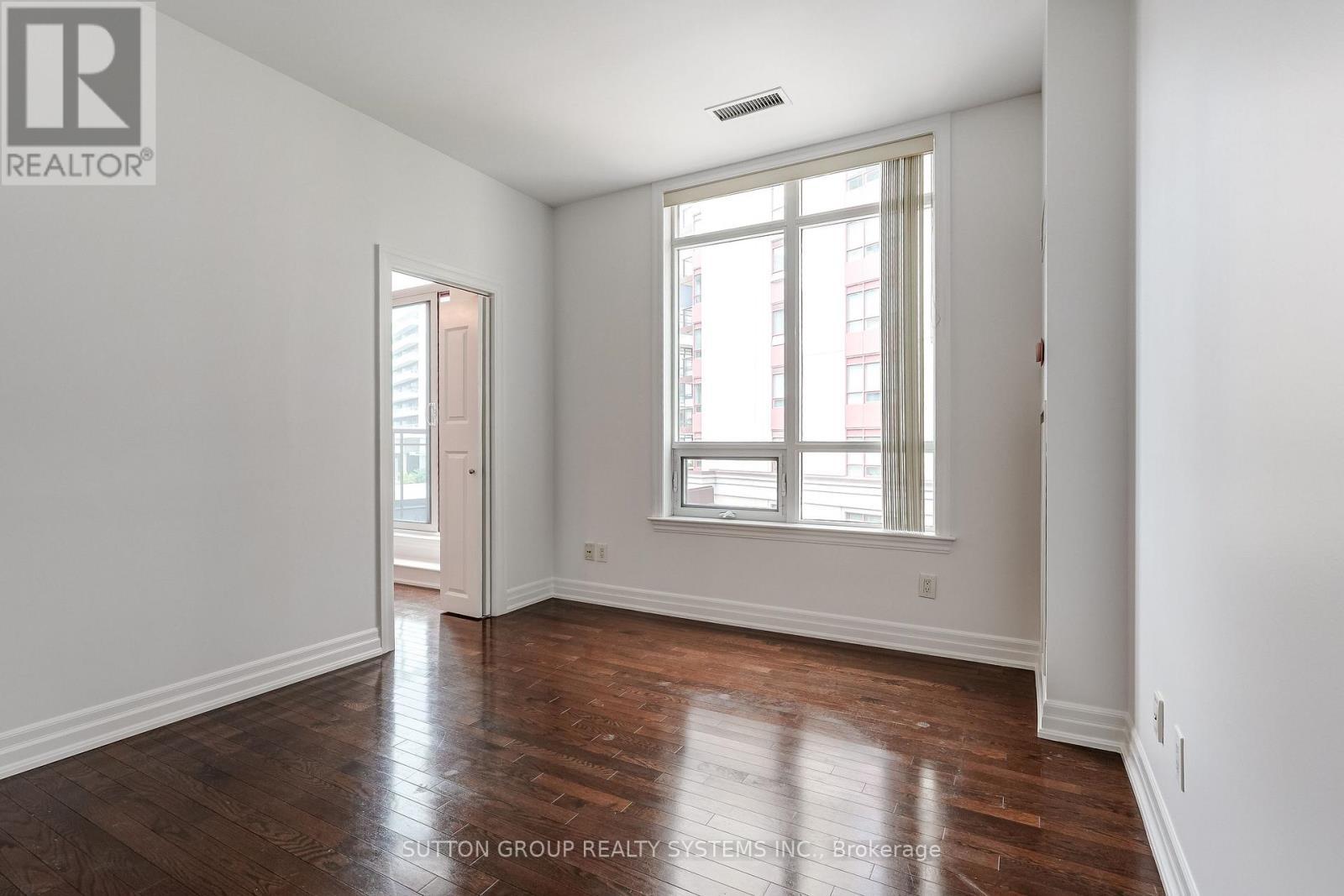 Living Room with Large Picture Window - 408 - 15 Rean Drive, Toronto, ON - Indoor Photo Showing Other Room