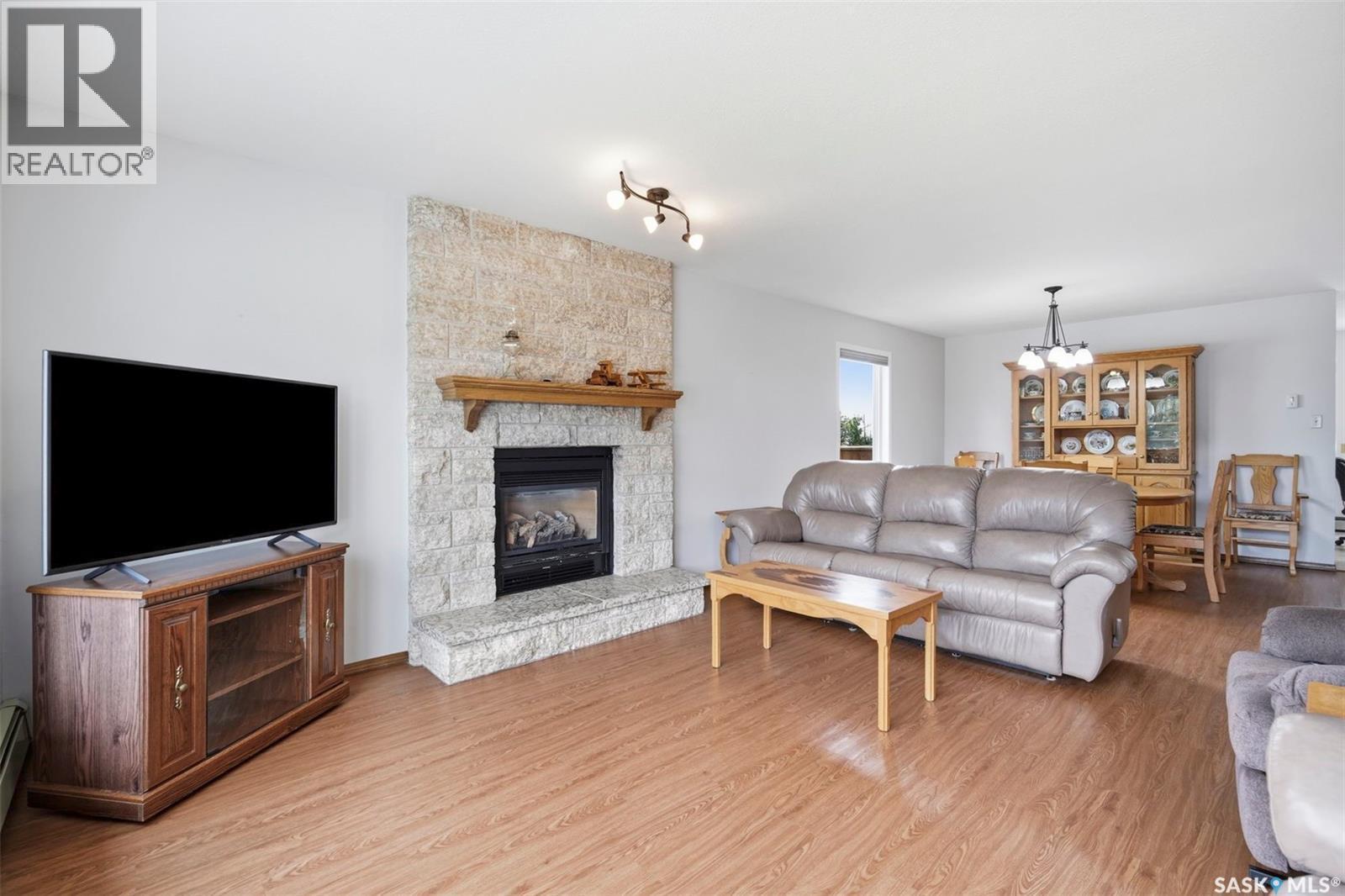 139 Wright Crescent, Biggar, SK - Indoor Photo Showing Living Room With Fireplace