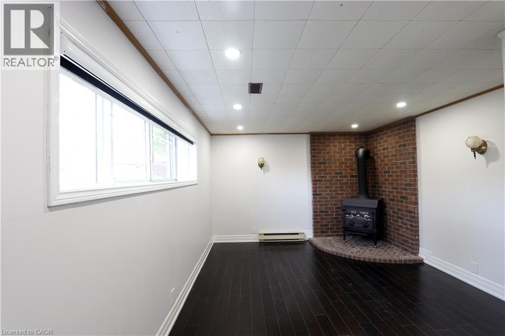 77 Orchard Mill Crescent, Kitchener, ON - Indoor Photo Showing Other Room With Fireplace