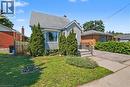 Gabled roofline, light-colored siding, and a prominent bay window - 16 Mercer Road, Cambridge, ON  - Outdoor 