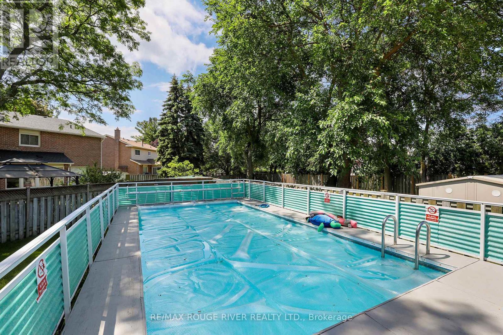 Heated Swimming Pool - 11 Canmore Boulevard, Toronto, ON - Outdoor With In Ground Pool