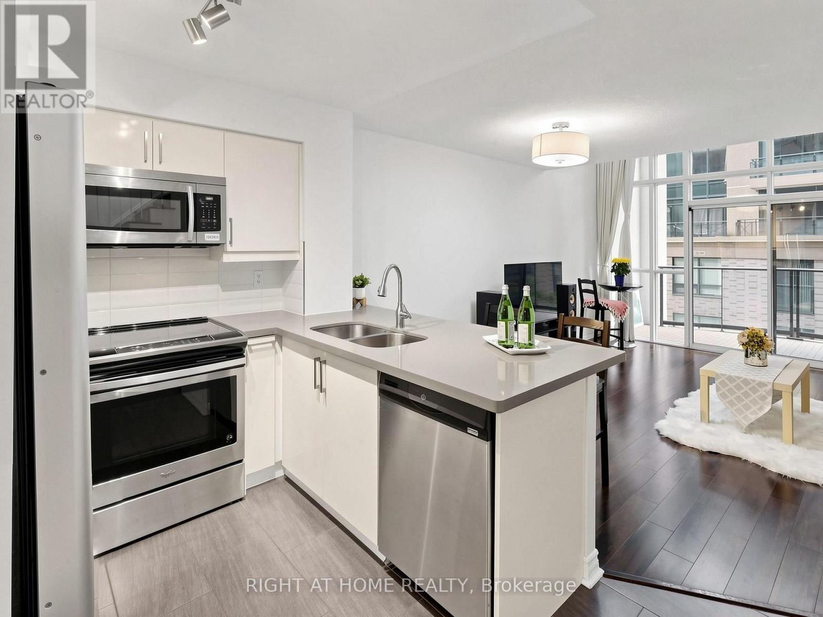 404 - 30 Hayden Street, Toronto, ON - Indoor Photo Showing Kitchen With Double Sink