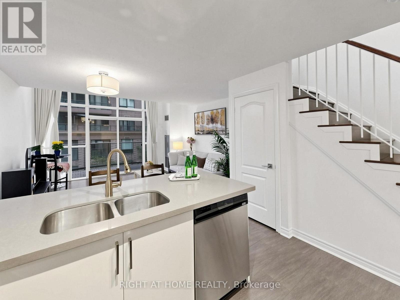 404 - 30 Hayden Street, Toronto, ON - Indoor Photo Showing Kitchen With Double Sink