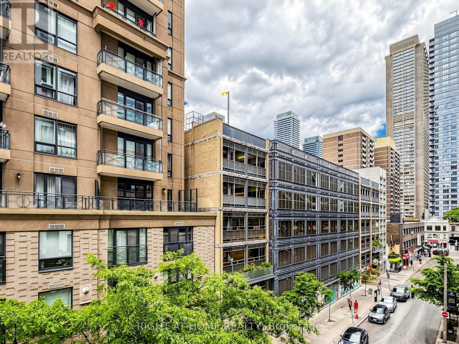404 - 30 Hayden Street, Toronto, ON - Outdoor With Balcony With Facade