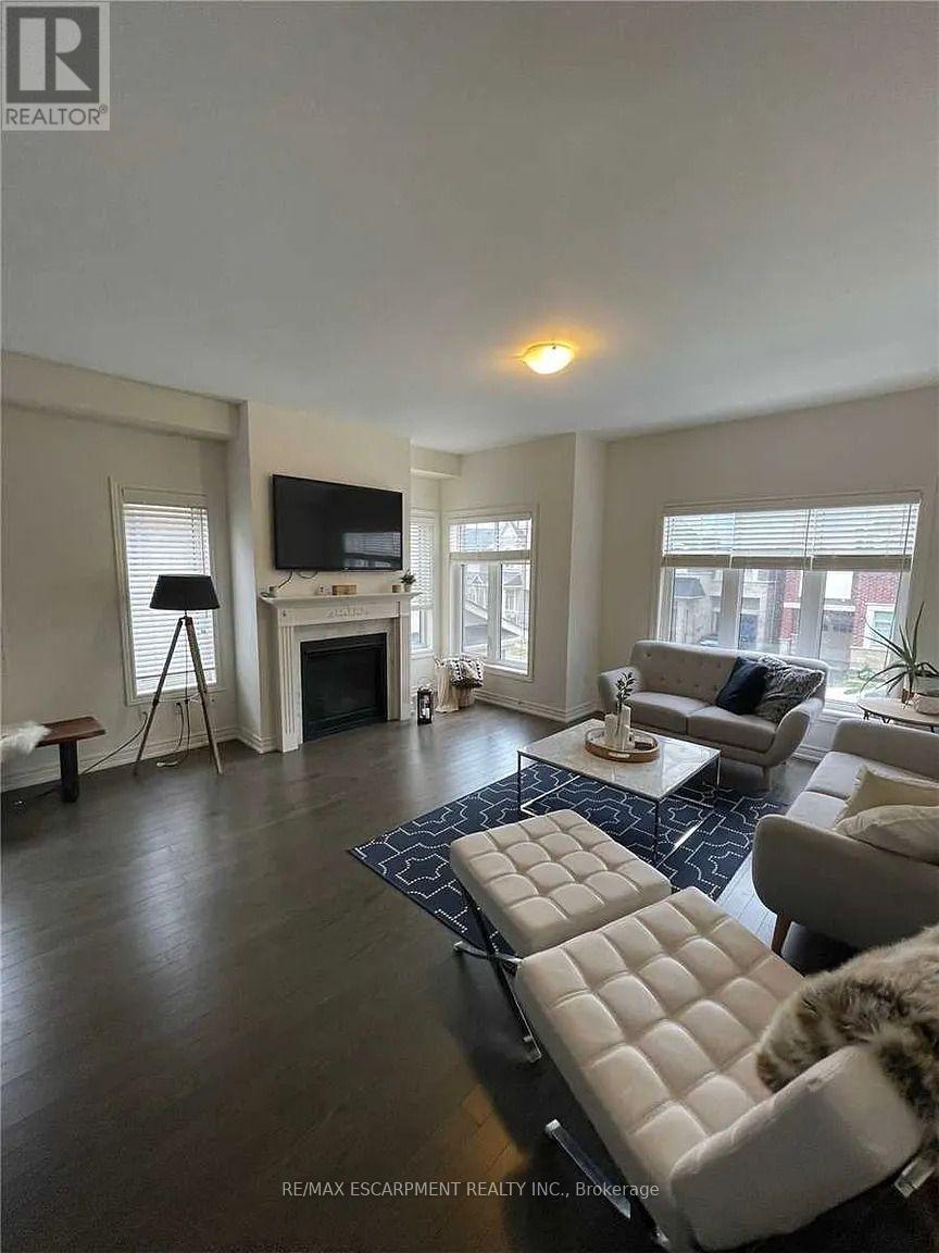 3930 Tufgar Crescent, Burlington, ON - Indoor Photo Showing Living Room With Fireplace