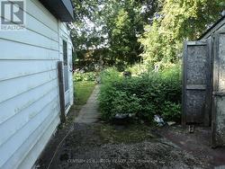 View towards backyard from back of carport - 