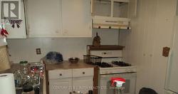 Closer view of kitchen - 