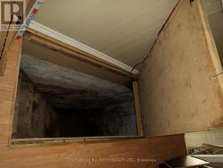 Floor hatch into basement, located in main hallway - 
