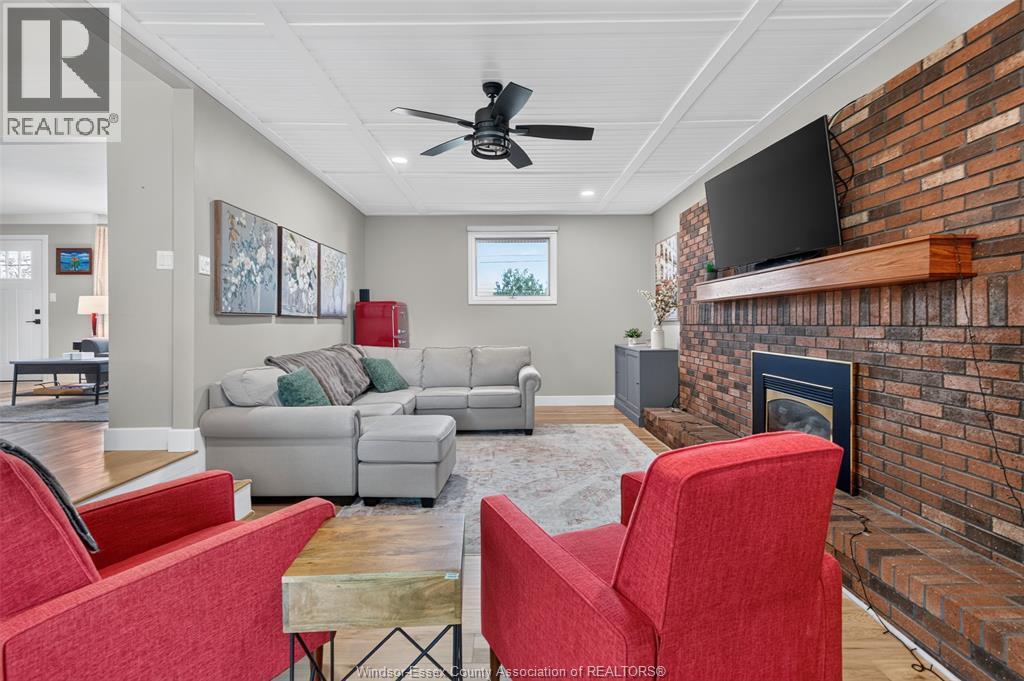 520 Front Road, Lasalle, ON - Indoor Photo Showing Living Room With Fireplace