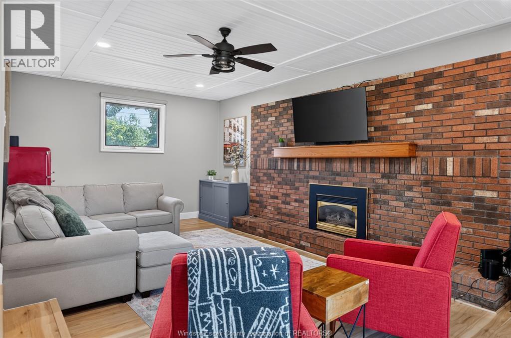520 Front Road, Lasalle, ON - Indoor Photo Showing Living Room With Fireplace