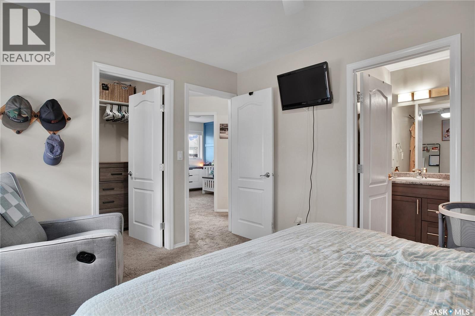 710 Redwood Crescent, Warman, SK - Indoor Photo Showing Bedroom