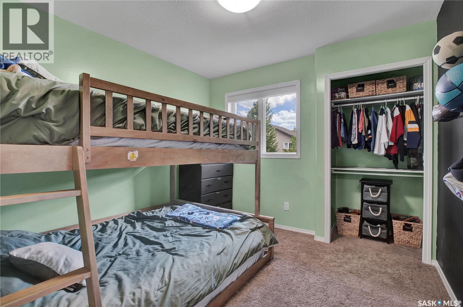 710 Redwood Crescent, Warman, SK - Indoor Photo Showing Bedroom