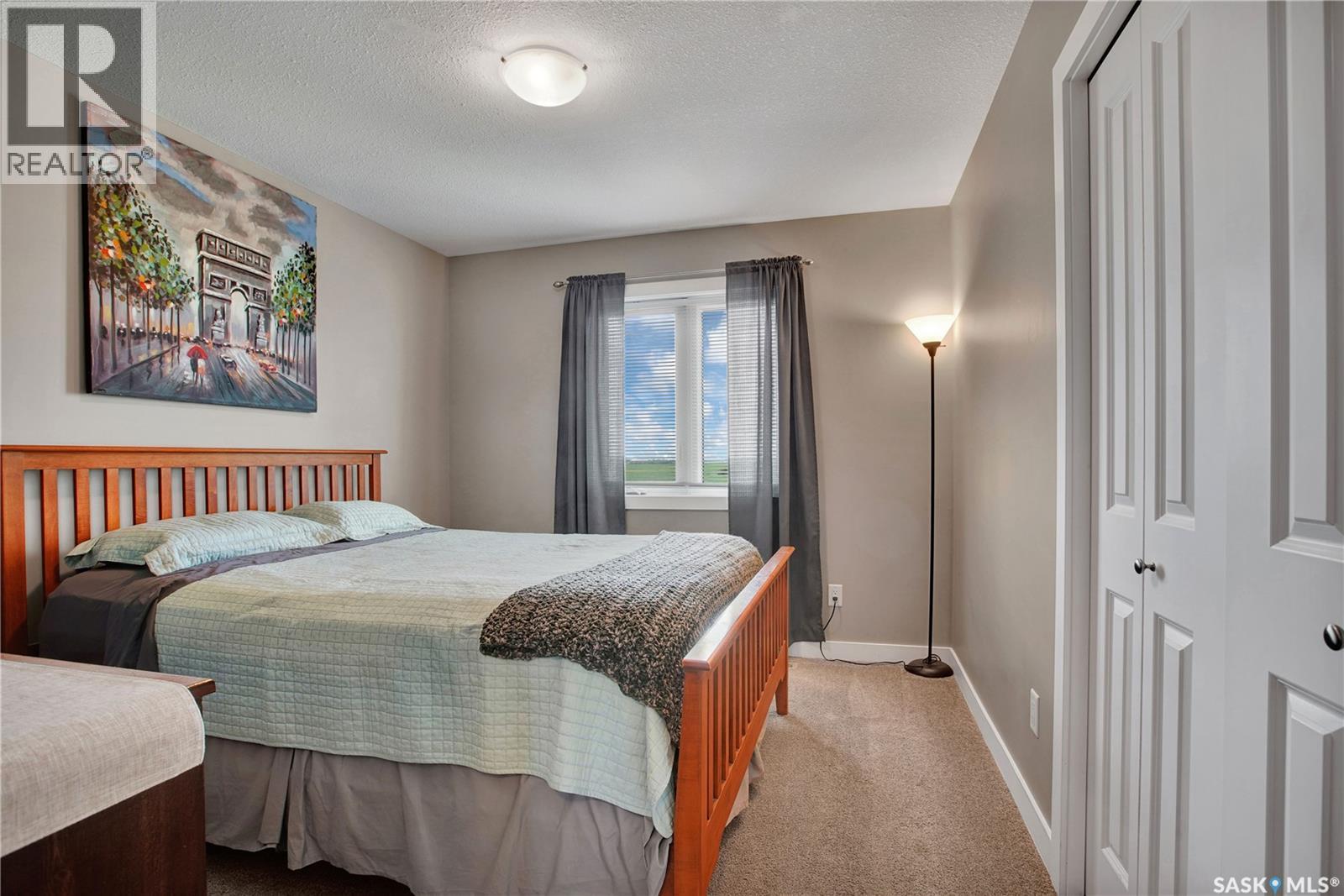 539 Maple Crescent, Warman, SK - Indoor Photo Showing Bedroom