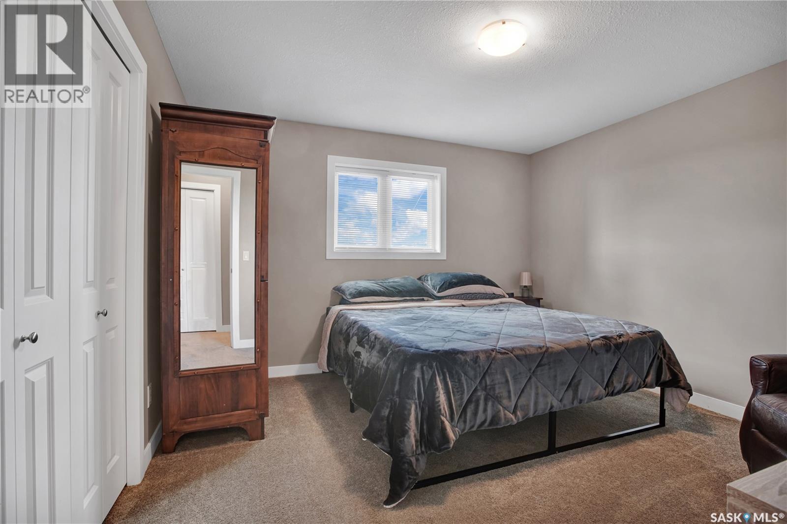 539 Maple Crescent, Warman, SK - Indoor Photo Showing Bedroom