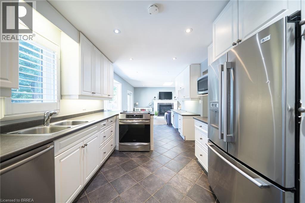 20 Hogarth Road, Brantford, ON - Indoor Photo Showing Kitchen With Stainless Steel Kitchen With Double Sink With Upgraded Kitchen