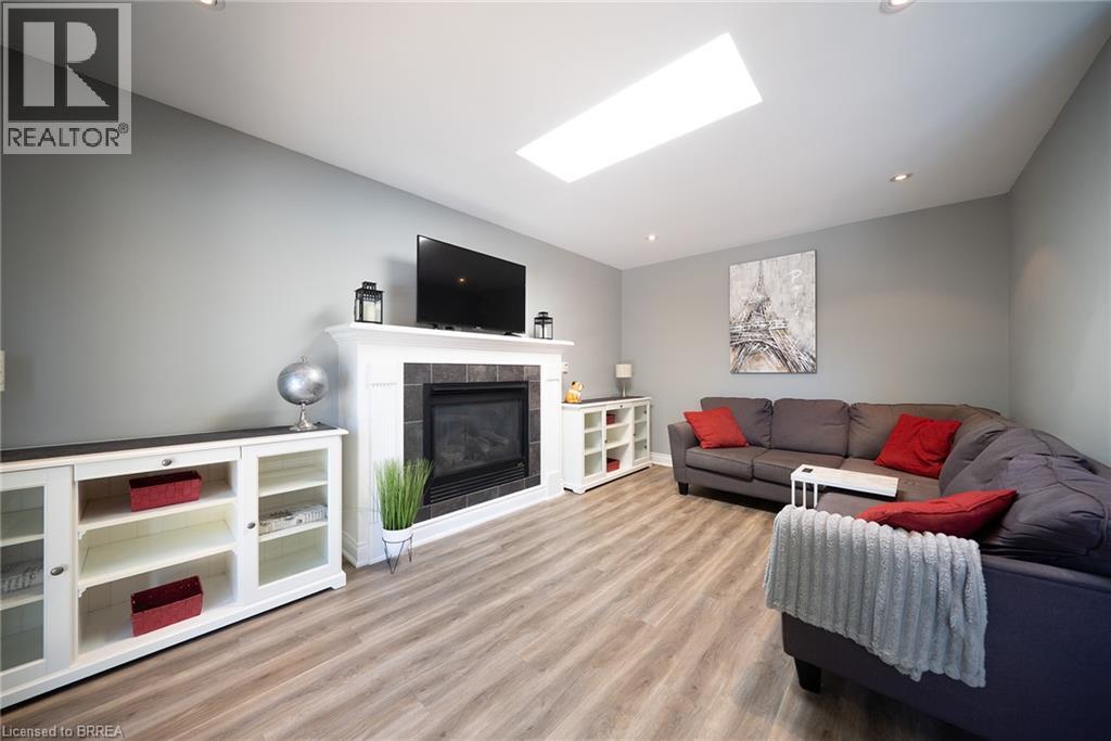 20 Hogarth Road, Brantford, ON - Indoor Photo Showing Living Room With Fireplace