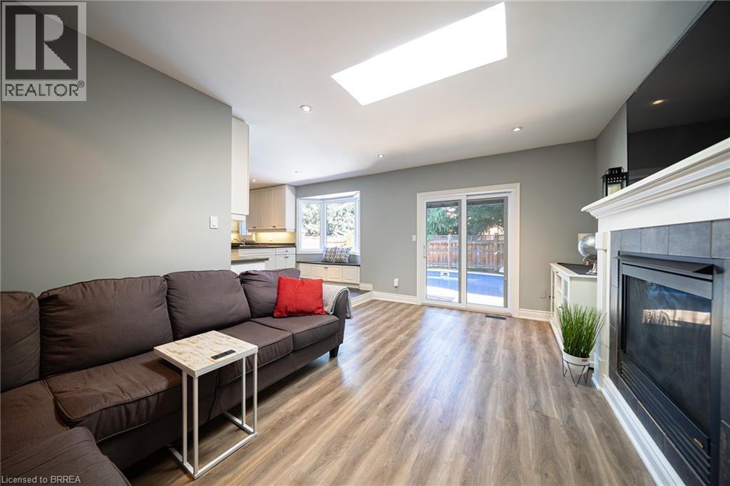 20 Hogarth Road, Brantford, ON - Indoor Photo Showing Living Room With Fireplace