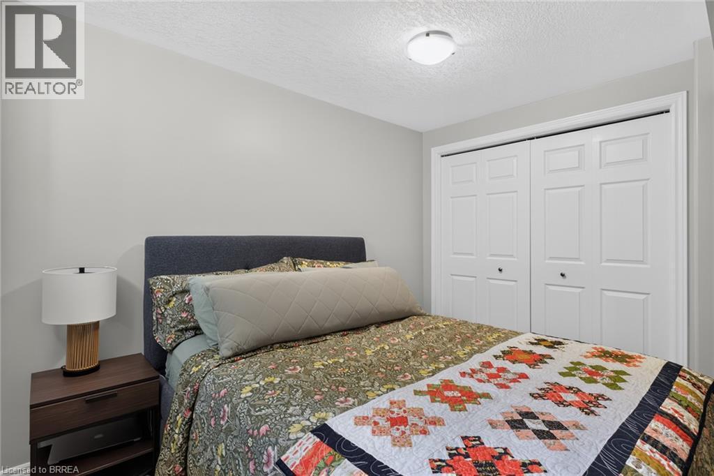 219 Shellard Lane Unit# 11, Brantford, ON - Indoor Photo Showing Bedroom
