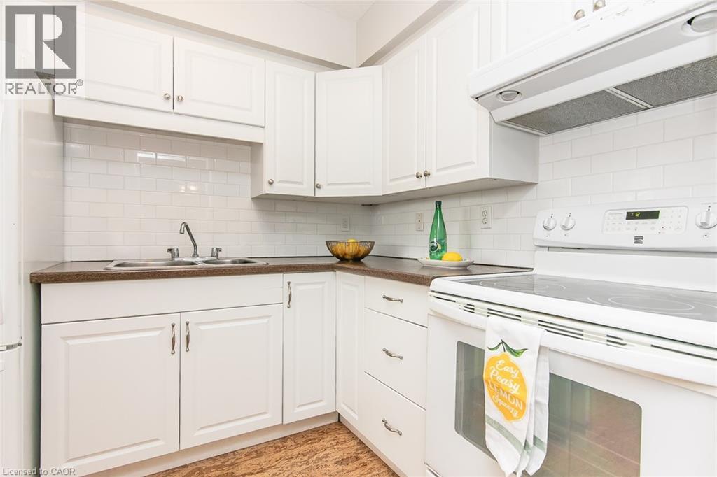 24 Midland Drive Unit# 402, Kitchener, ON - Indoor Photo Showing Kitchen With Double Sink