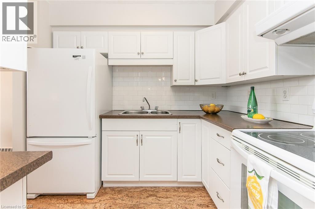 24 Midland Drive Unit# 402, Kitchener, ON - Indoor Photo Showing Kitchen With Double Sink