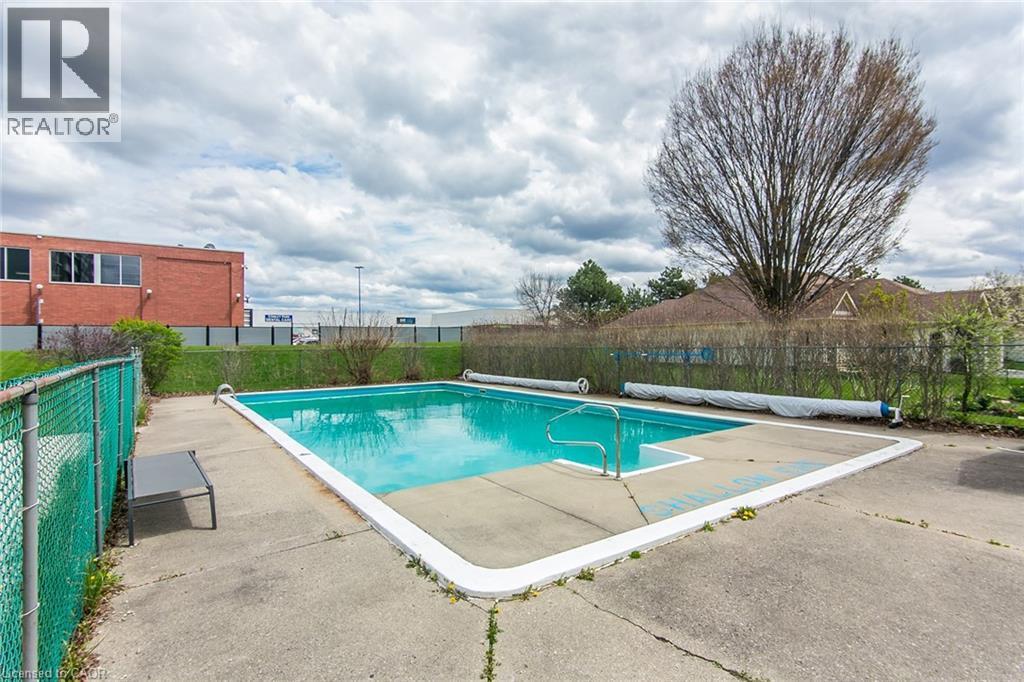 24 Midland Drive Unit# 402, Kitchener, ON - Outdoor With In Ground Pool