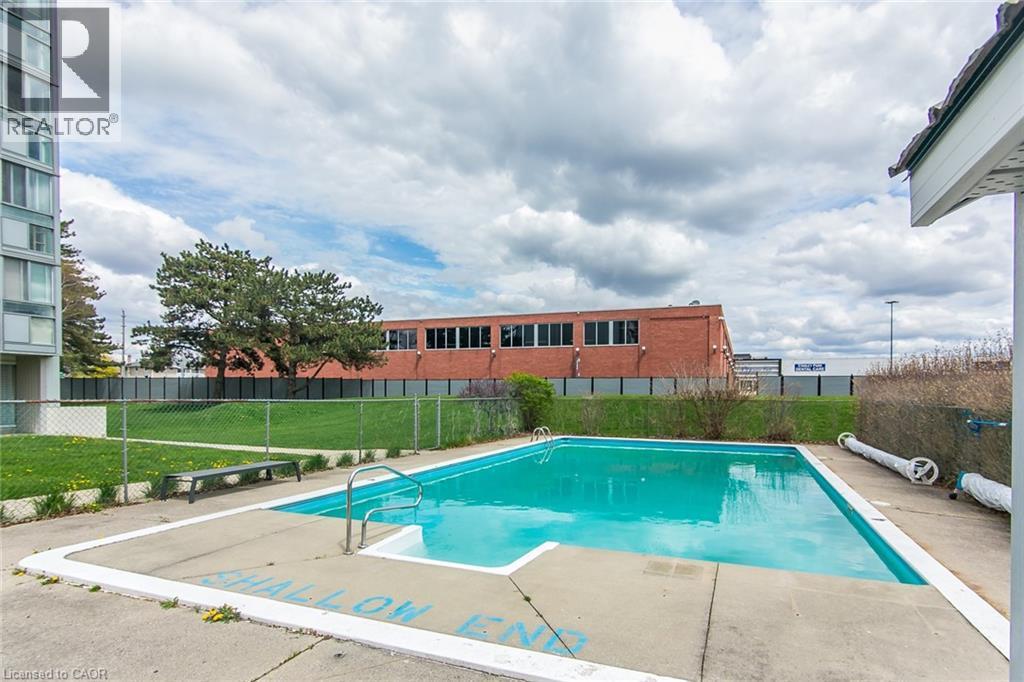 24 Midland Drive Unit# 402, Kitchener, ON - Outdoor With In Ground Pool With Backyard