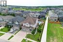 Two-story residence featuring a covered front entry, attached two-car garage, and a rear yard with a fenced swimming pool - 167 Westcliff Way, Cambridge, ON  - Outdoor With View 