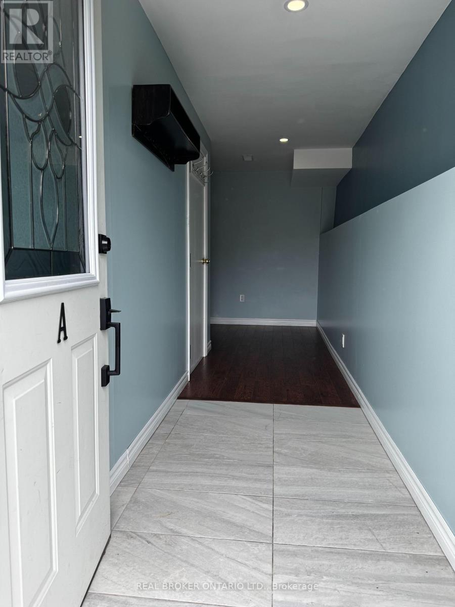 Private entrance to unit A - A - 34 Engel Crescent, Barrie, ON - Indoor Photo Showing Other Room