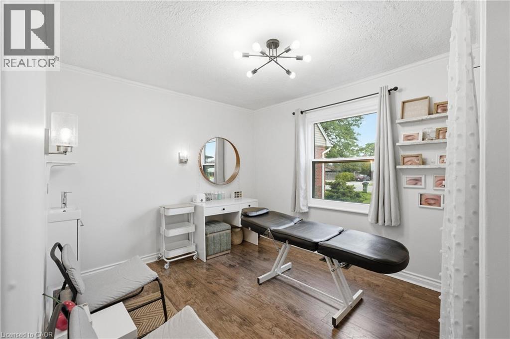 Bedroom currently being used as a treatment room which can easily be converted back - 481 Upper Gage Avenue, Hamilton, ON - Indoor Photo Showing Office