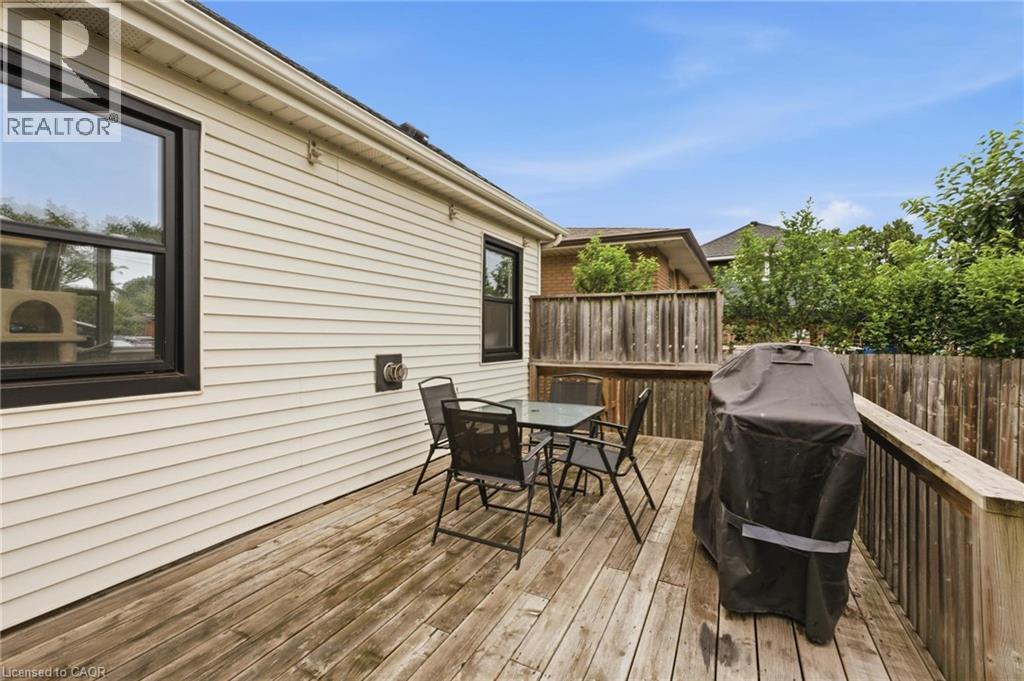 Expansive wooden deck with perimeter railing - 481 Upper Gage Avenue, Hamilton, ON - Outdoor With Deck Patio Veranda With Exterior