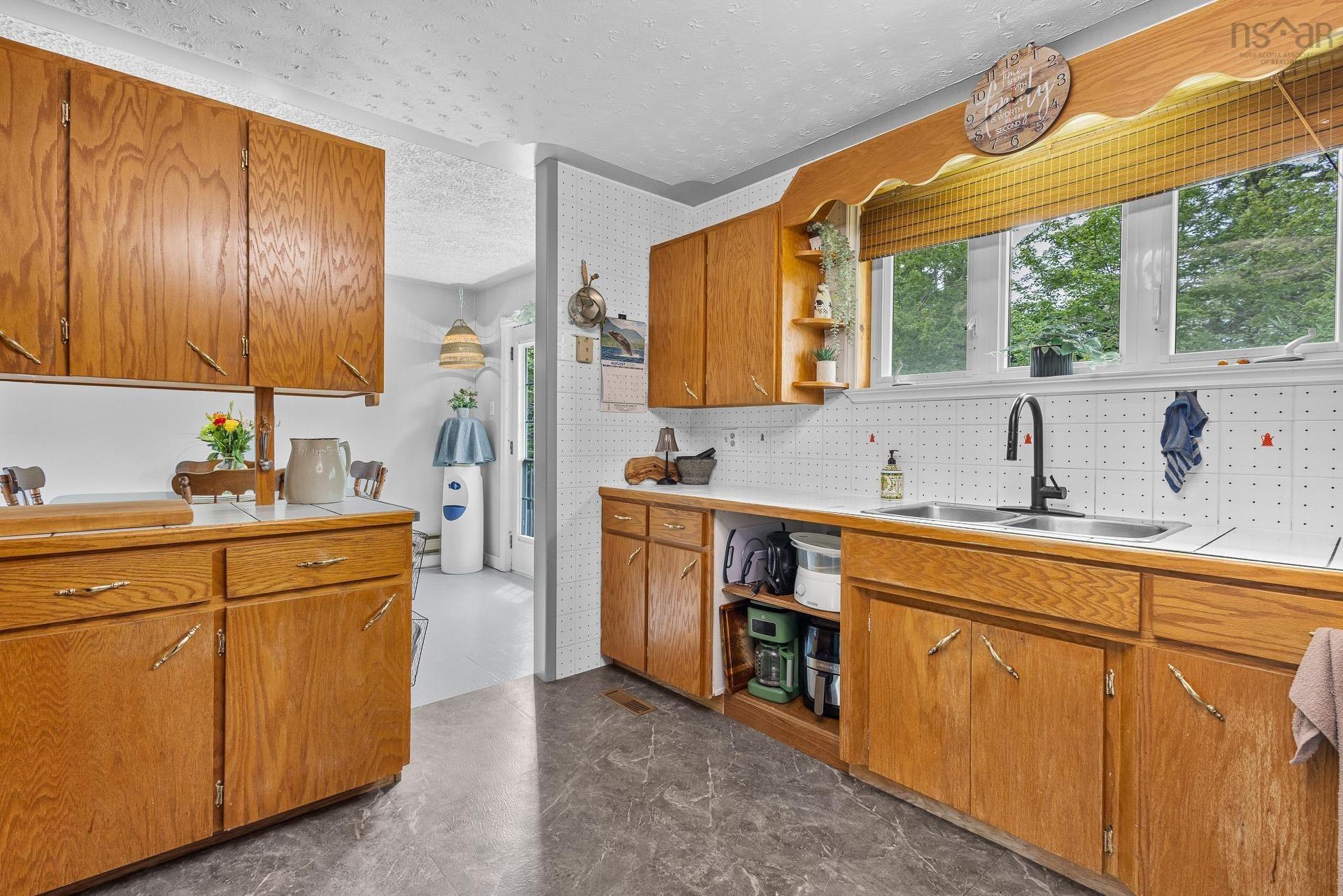 62 Murphys Road, Murphy Cove, NS - Indoor Photo Showing Kitchen With Double Sink