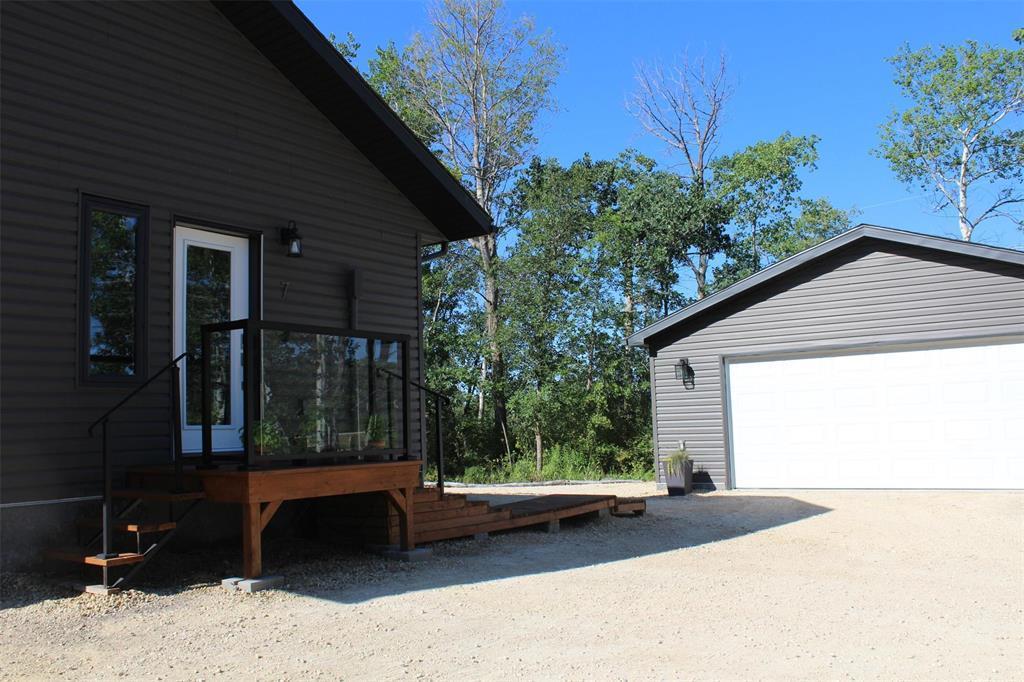 Garage is located only steps from the home! - 7 Dalvik Road, Gimli Rm, MB - Outdoor With Exterior