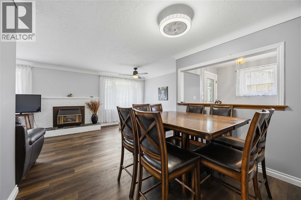 146 Westview Drive, St Clair, ON - Indoor Photo Showing Dining Room With Fireplace
