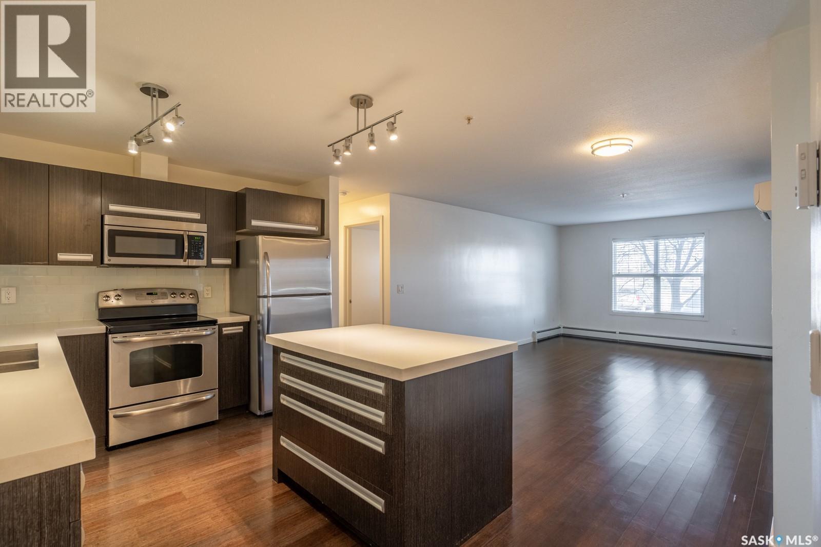 102 1610 Dakota Drive, Regina, SK - Indoor Photo Showing Kitchen With Stainless Steel Kitchen With Double Sink
