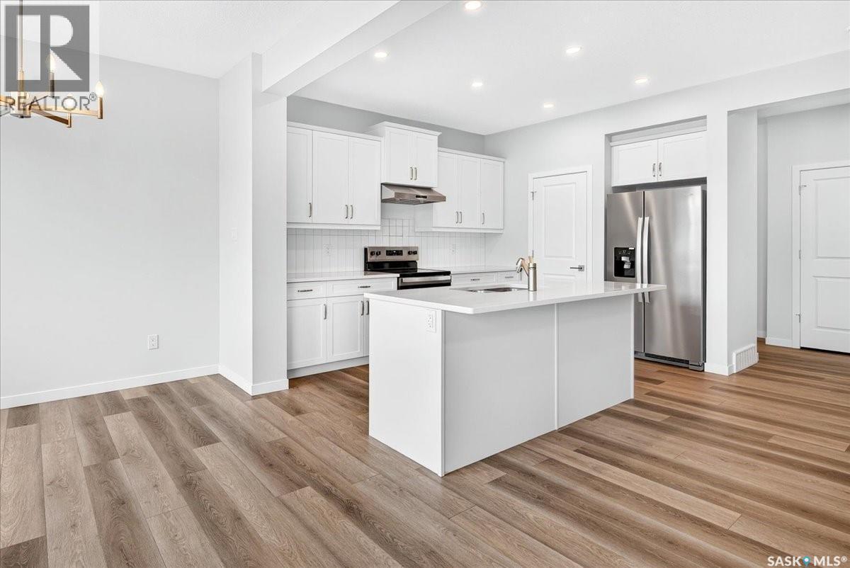 3296 Favel Drive, Regina, SK - Indoor Photo Showing Kitchen With Stainless Steel Kitchen With Upgraded Kitchen