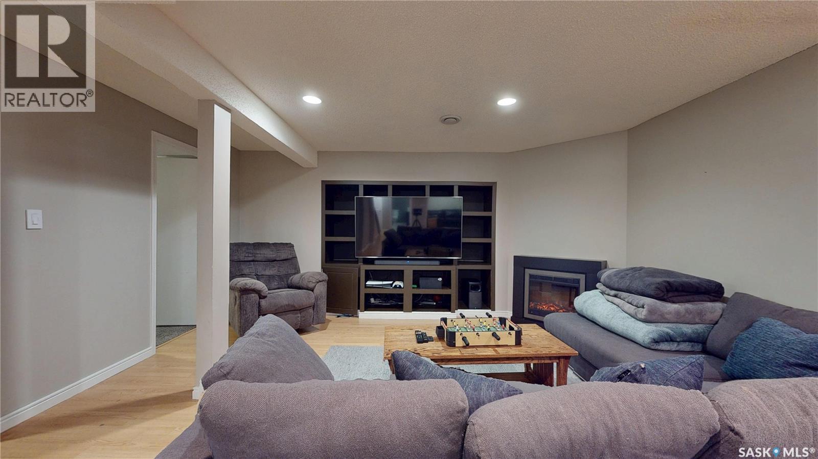 3107 Andreychuk Place E, Regina, SK - Indoor With Fireplace