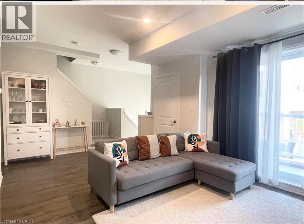 Recessed lighting and track lighting fixtures illuminate the space - 17 Visionary Avenue, Kitchener, ON - Indoor