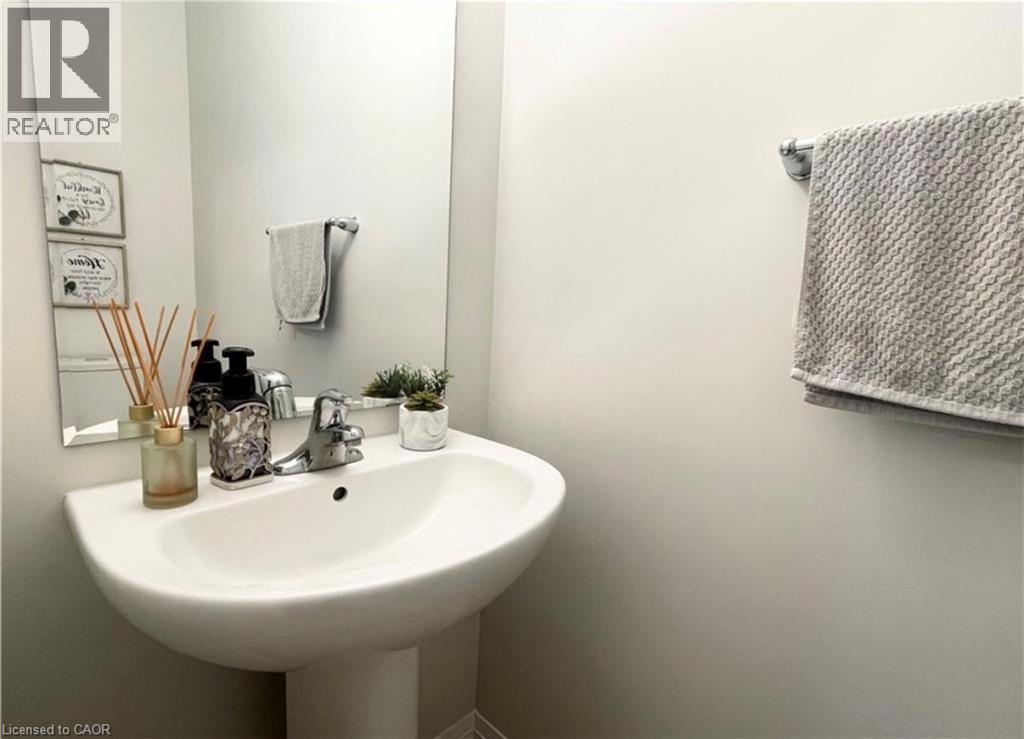 White pedestal sink with chrome faucet - 17 Visionary Avenue, Kitchener, ON - Indoor Photo Showing Bathroom