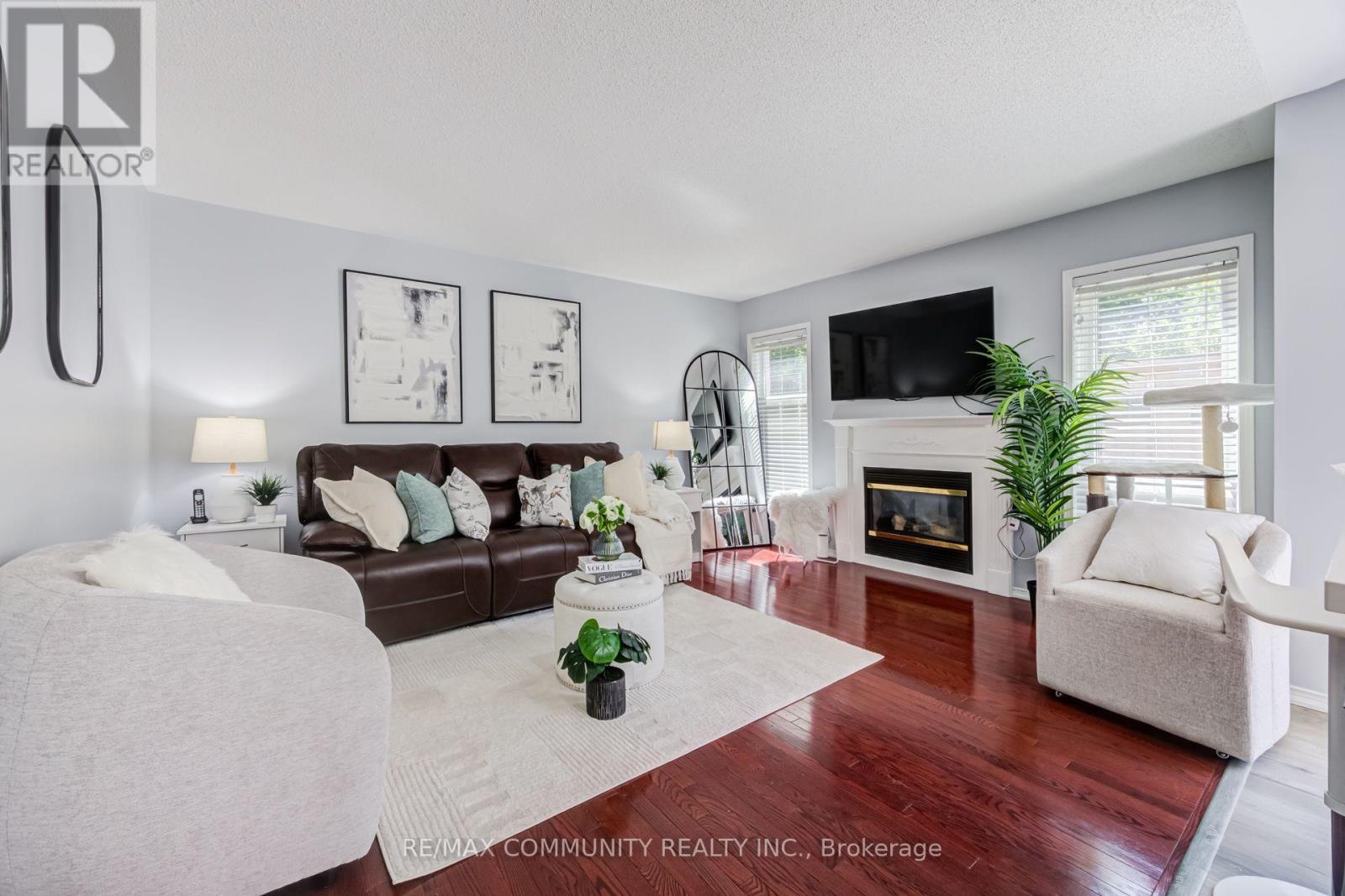 69 Mcsweeney Crescent, Ajax, ON - Indoor Photo Showing Living Room With Fireplace