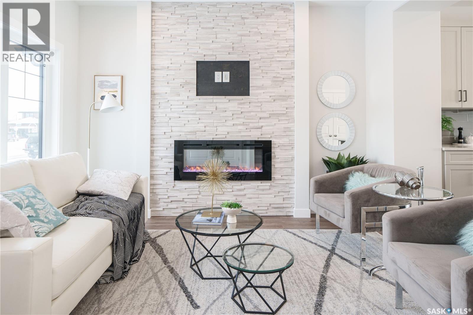 3116 Green Turtle Road, Regina, SK - Indoor Photo Showing Living Room With Fireplace
