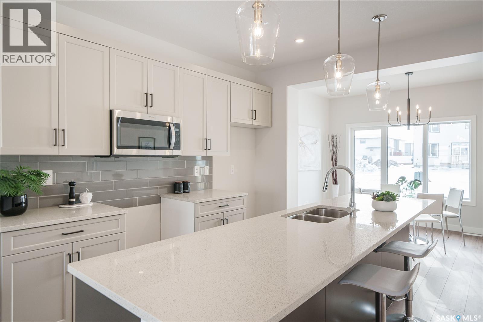 3116 Green Turtle Road, Regina, SK - Indoor Photo Showing Kitchen With Double Sink With Upgraded Kitchen