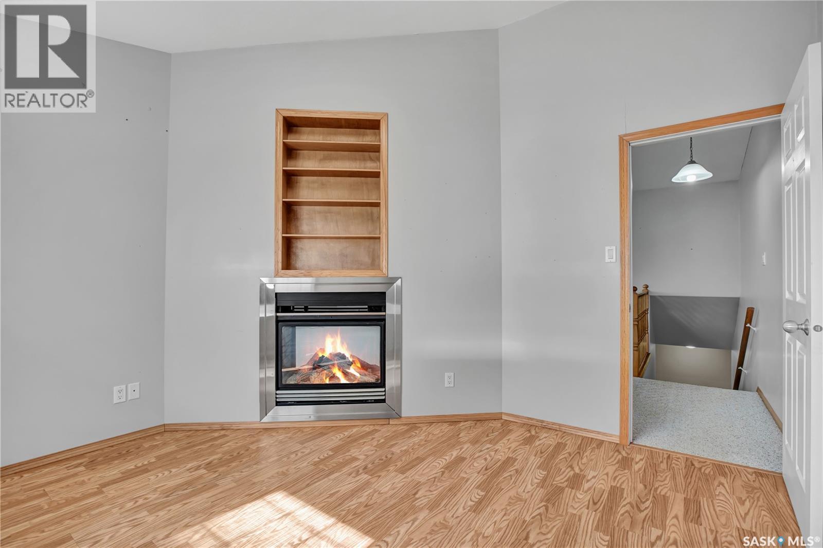 201 Centennial Road, Hague, SK - Indoor With Fireplace