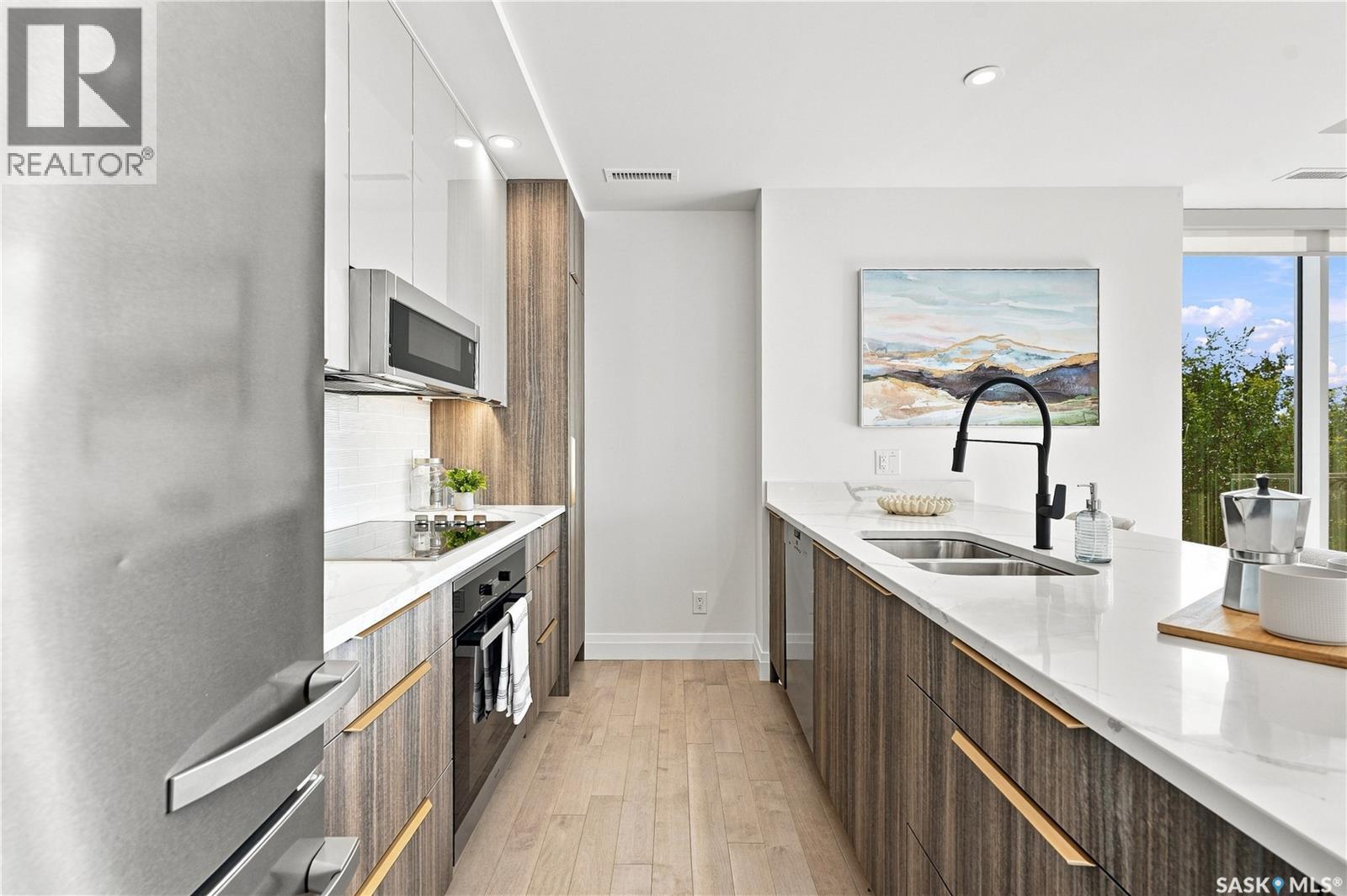 306 637 University Drive, Saskatoon, SK - Indoor Photo Showing Kitchen With Double Sink With Upgraded Kitchen