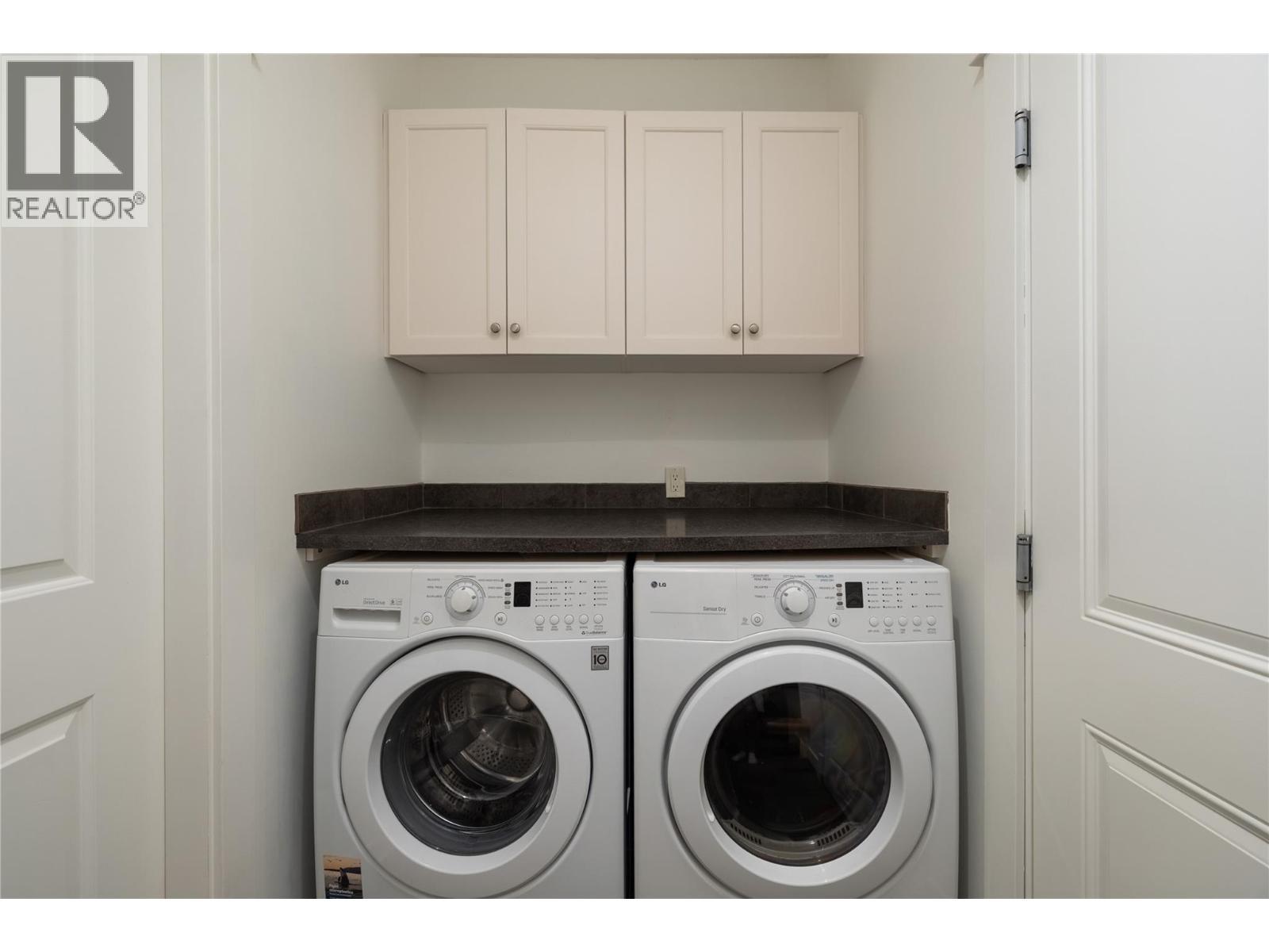 Laundry main level - 7261 Silver Ridge Drive, Vernon, BC - Indoor Photo Showing Laundry Room