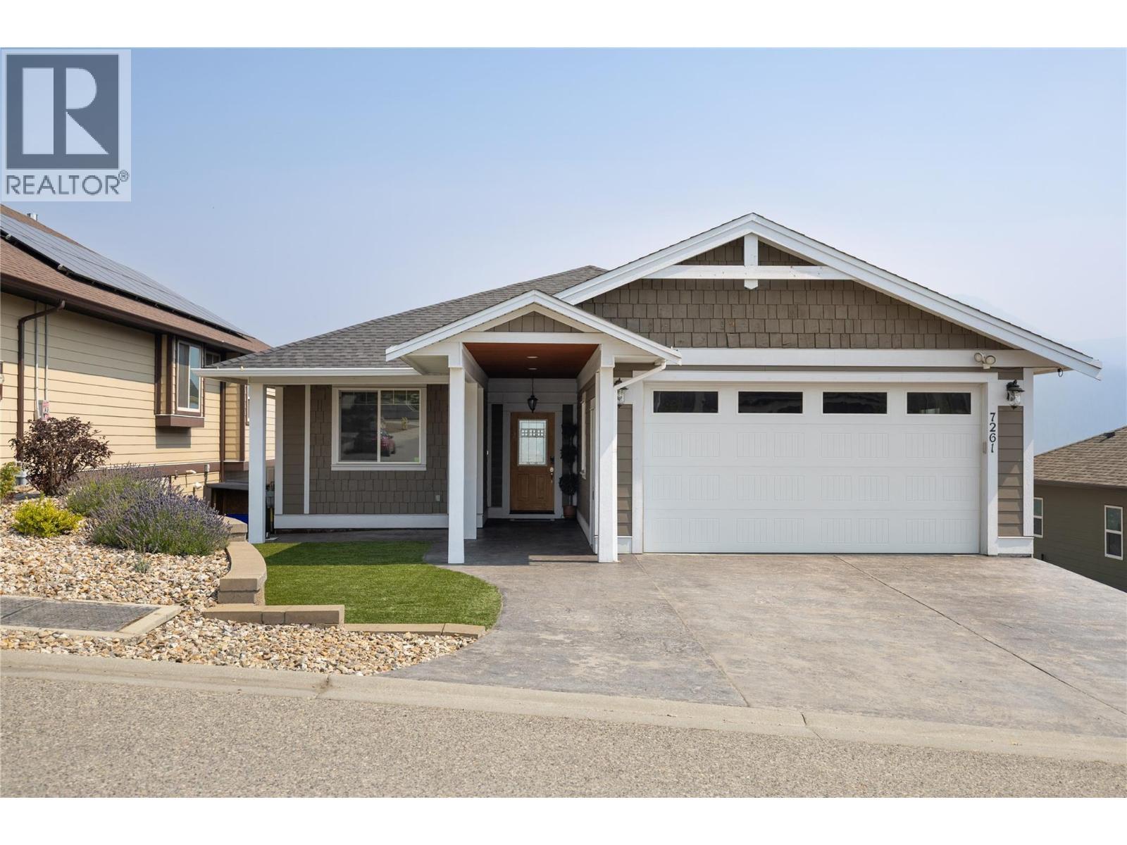 Stamped concrete drive - 7261 Silver Ridge Drive, Vernon, BC - Outdoor With Facade